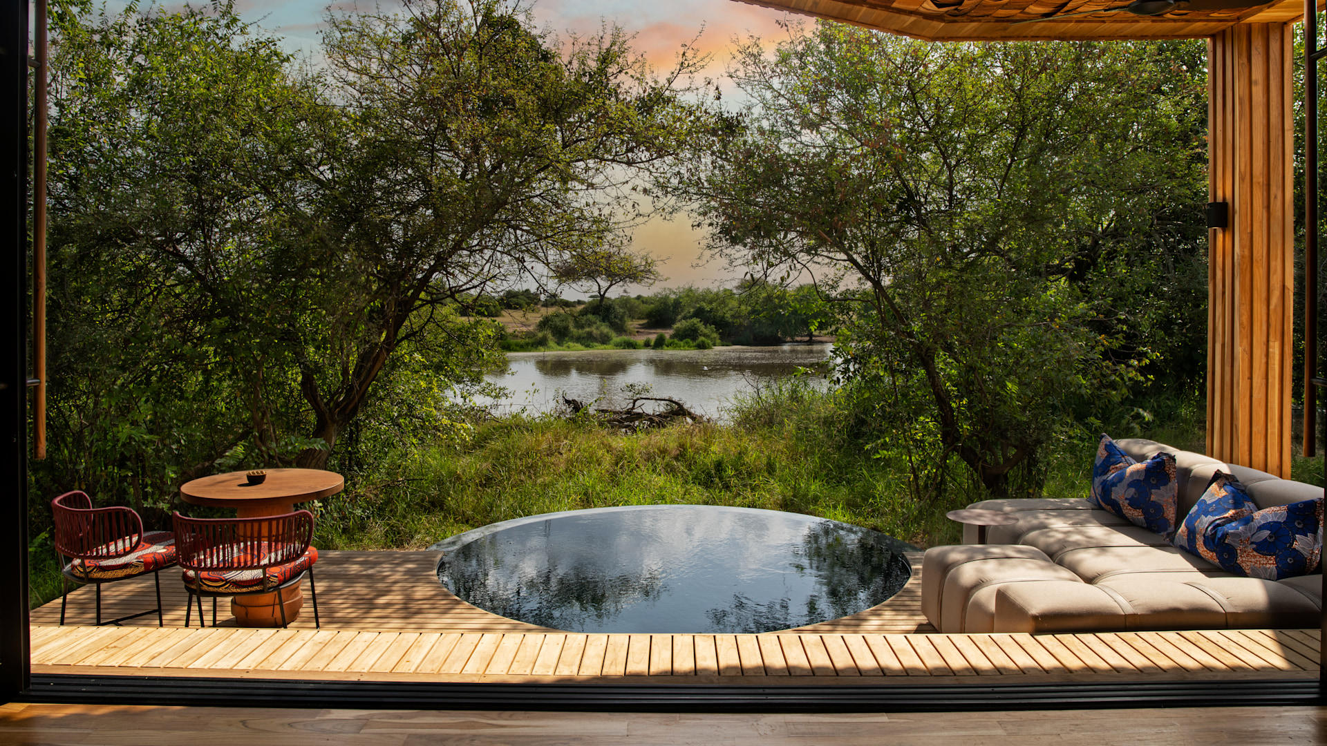 Suite with plunge pool and river view at andBeyond Grumeti Serengeti River Lodge, Tanzania